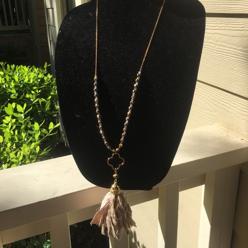 Gold tasseled necklace